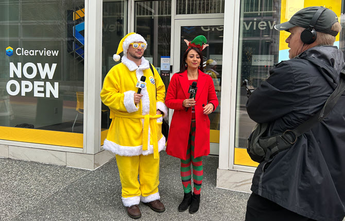 People filming in front of a new Clearview location