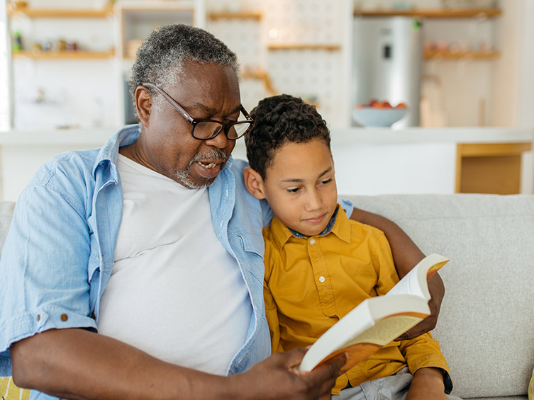 grandfather reading to child