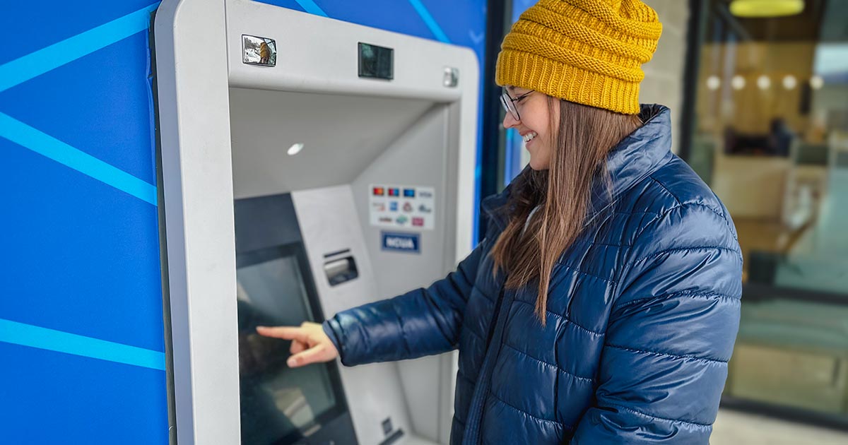 woman atm winter