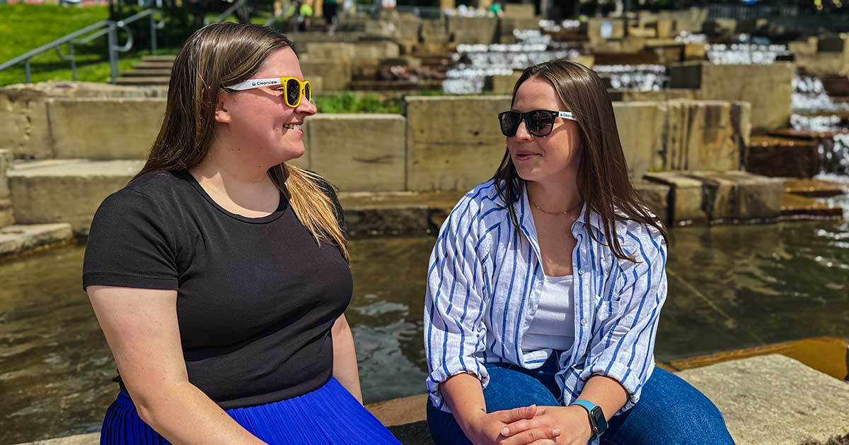 friends visiting downtown pittsburgh in sunglasses