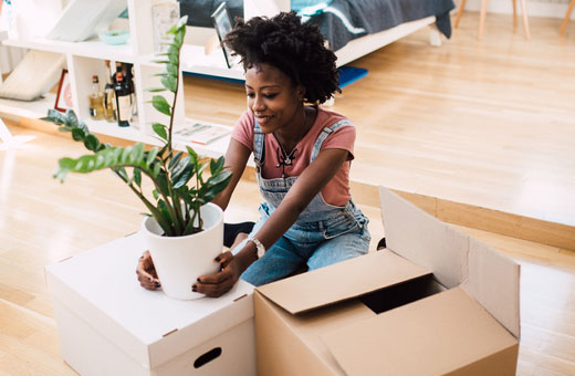 woman-unpacking-home