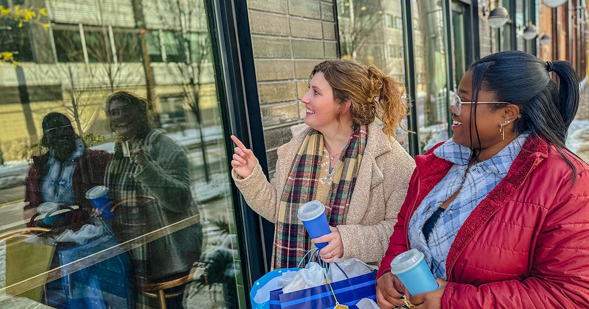 friends window shopping