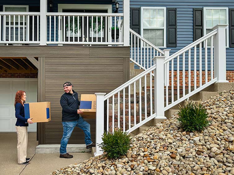 couple moving new home boxes