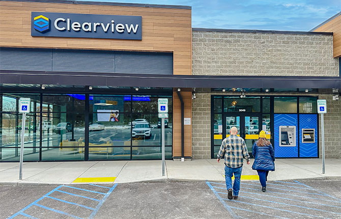 couple walking into clearview financial center