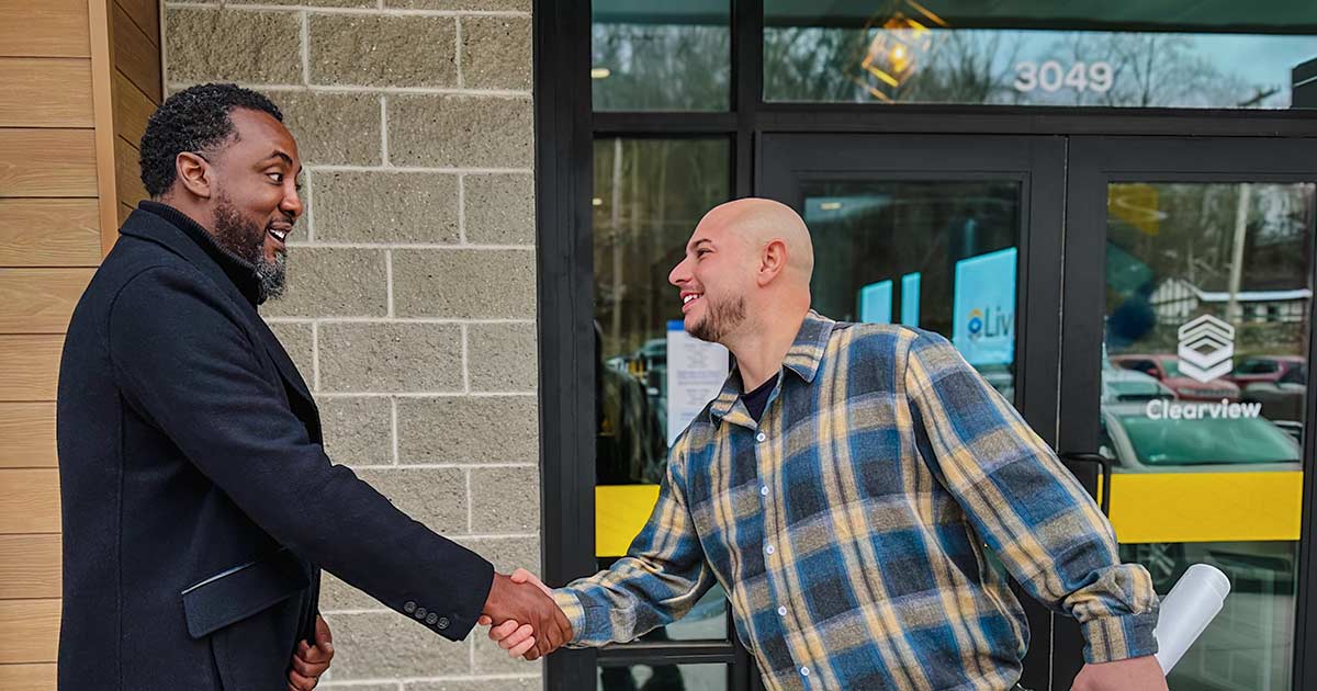 contractor member greeting outside clearview