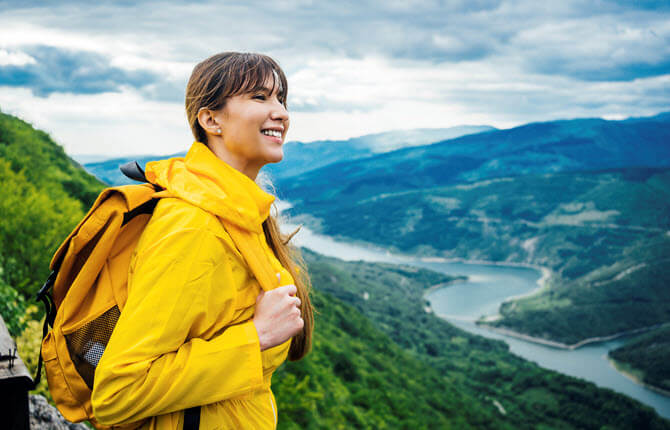 Woman hiking mountain