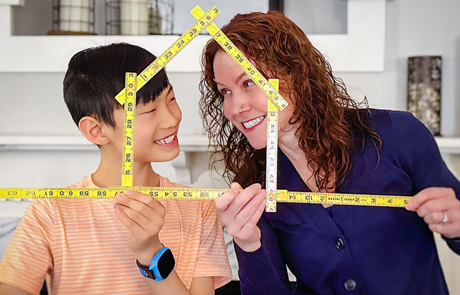 mother son home measuring tape