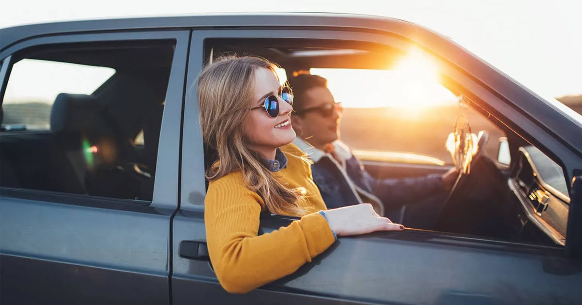 couple sunset car ride