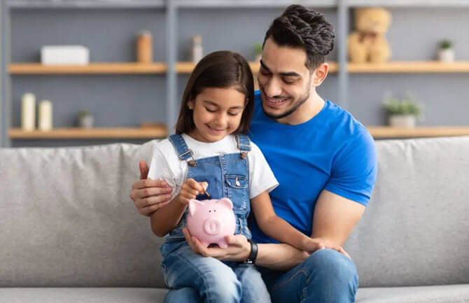 father-daughter-saving-money