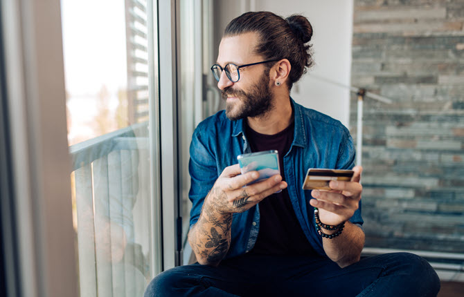 man-credit-card-window